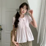 減齡娃娃壓褶排扣上衣